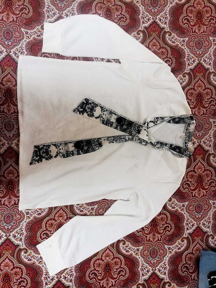 White Top with Black Tie