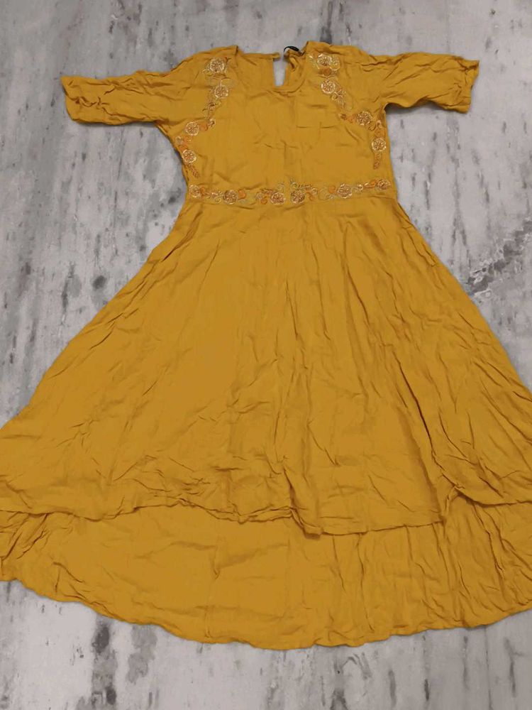 Girls wear Mustard Embroidered A-Line Kurta with s