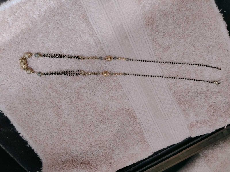 Elegant Mangalsutra and rhinestone snake bracelet