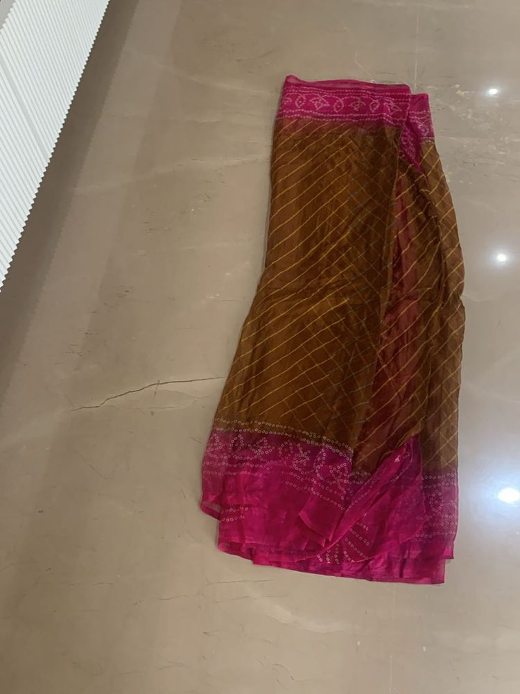 Lovely brown and pink bandhej sari