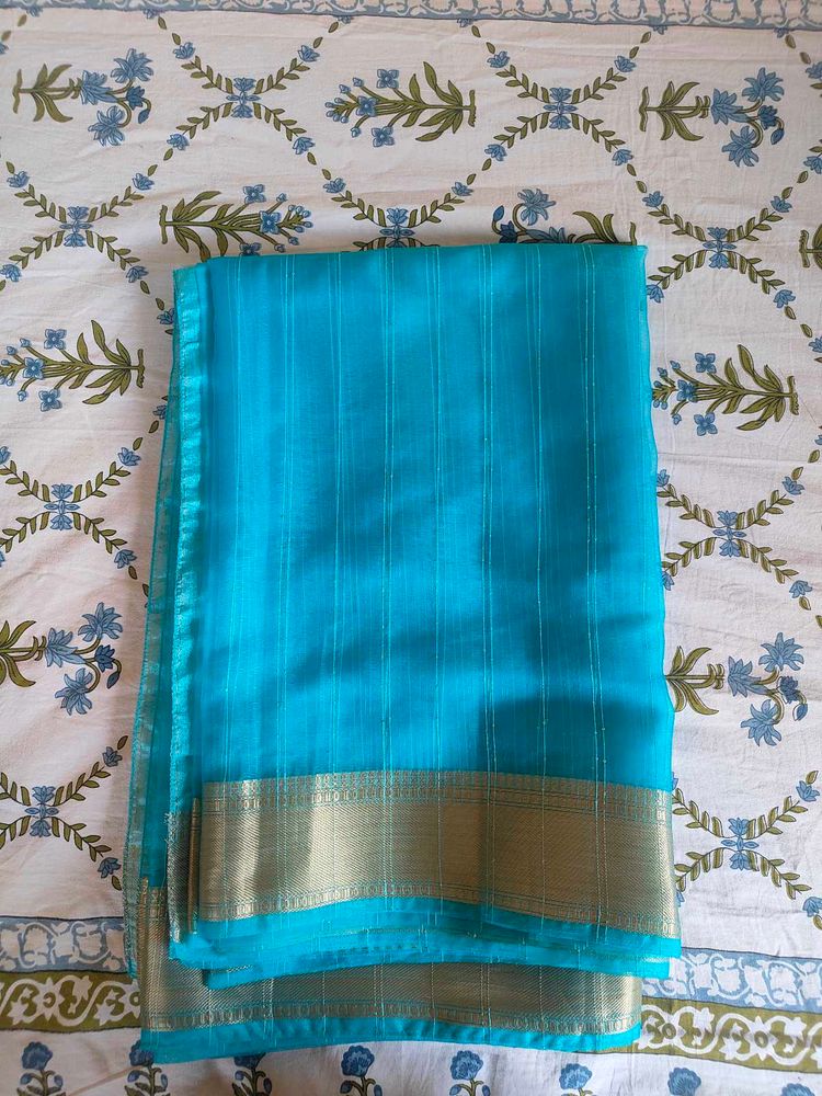 Aqua Blue with zari border saree