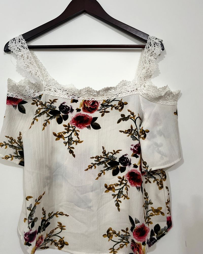 White Floral off-shoulder Top. No stains or damage. Never worn. Good as new!!