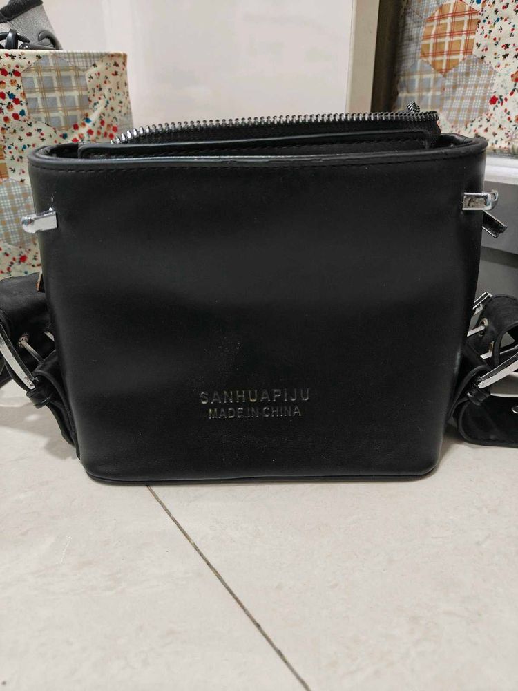 A Cute black Grungy Sling Bag