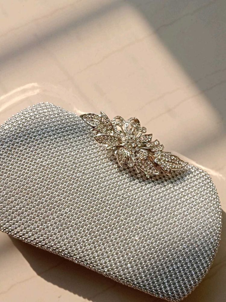 Silver Clutch With A Strap