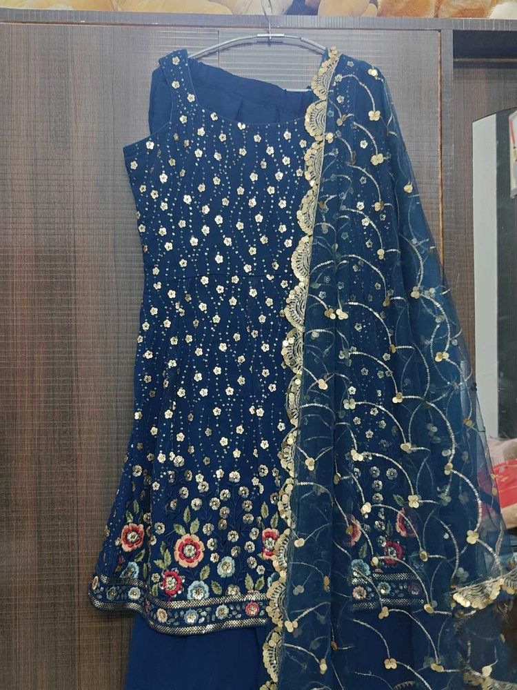 Peacock Peplum Suit