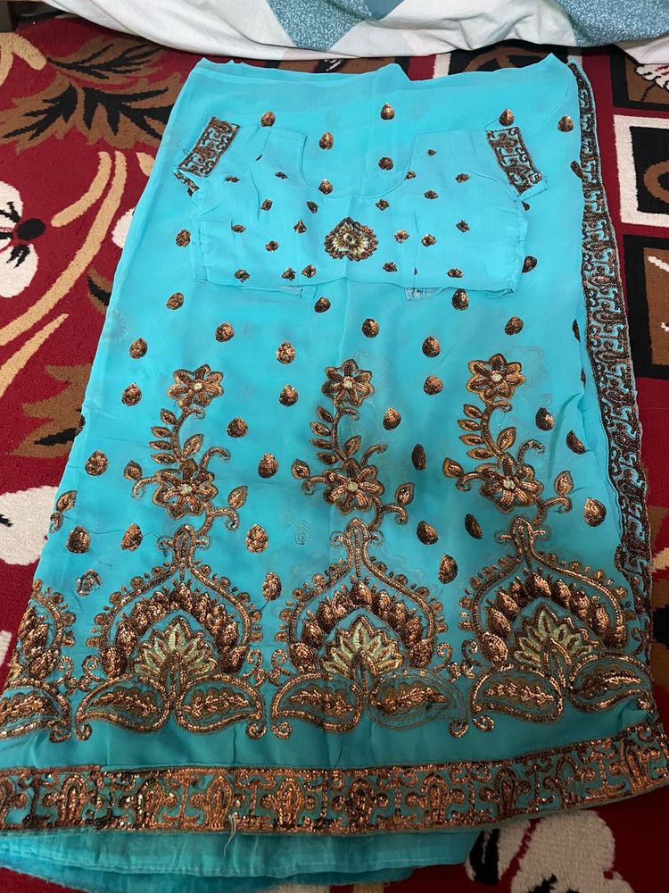 Traditional Turquoise Embroidered Saree with Golde