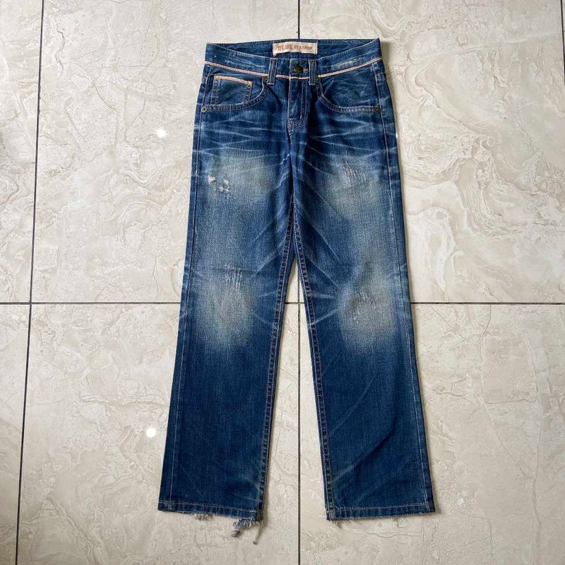 Distressed Wash Jeans