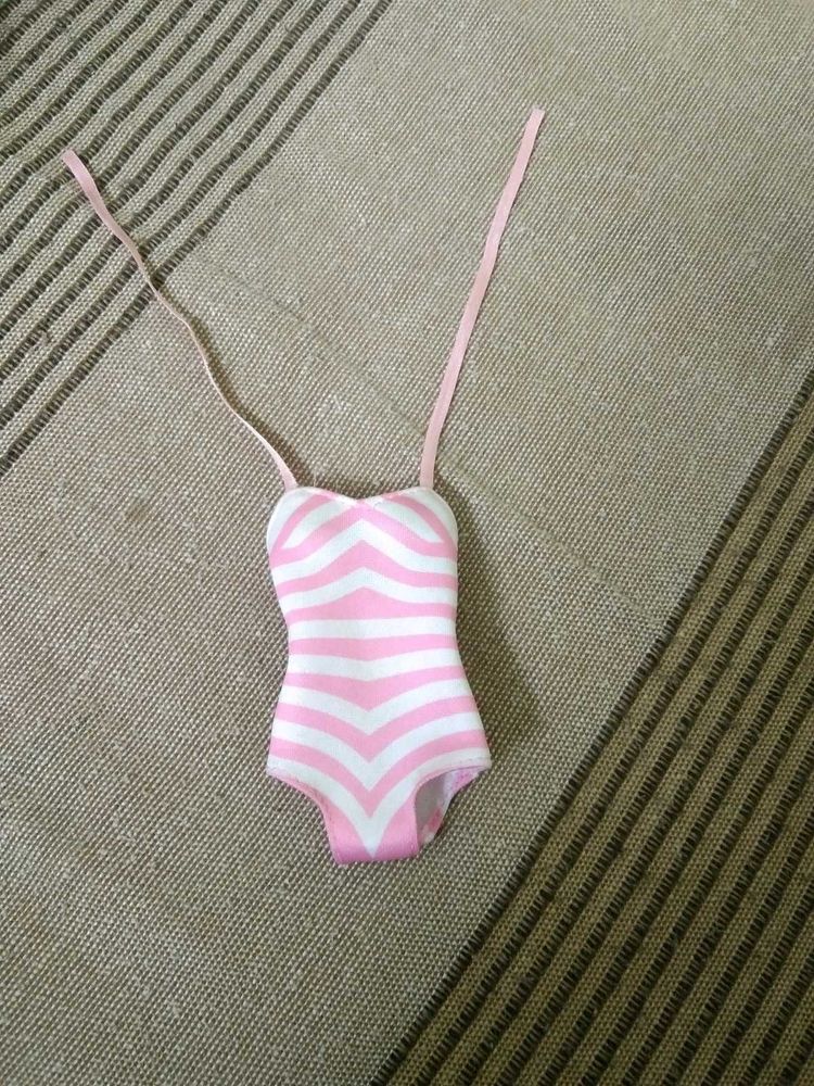 Pink &amp; White Striped Swimsuitand A Scirt.