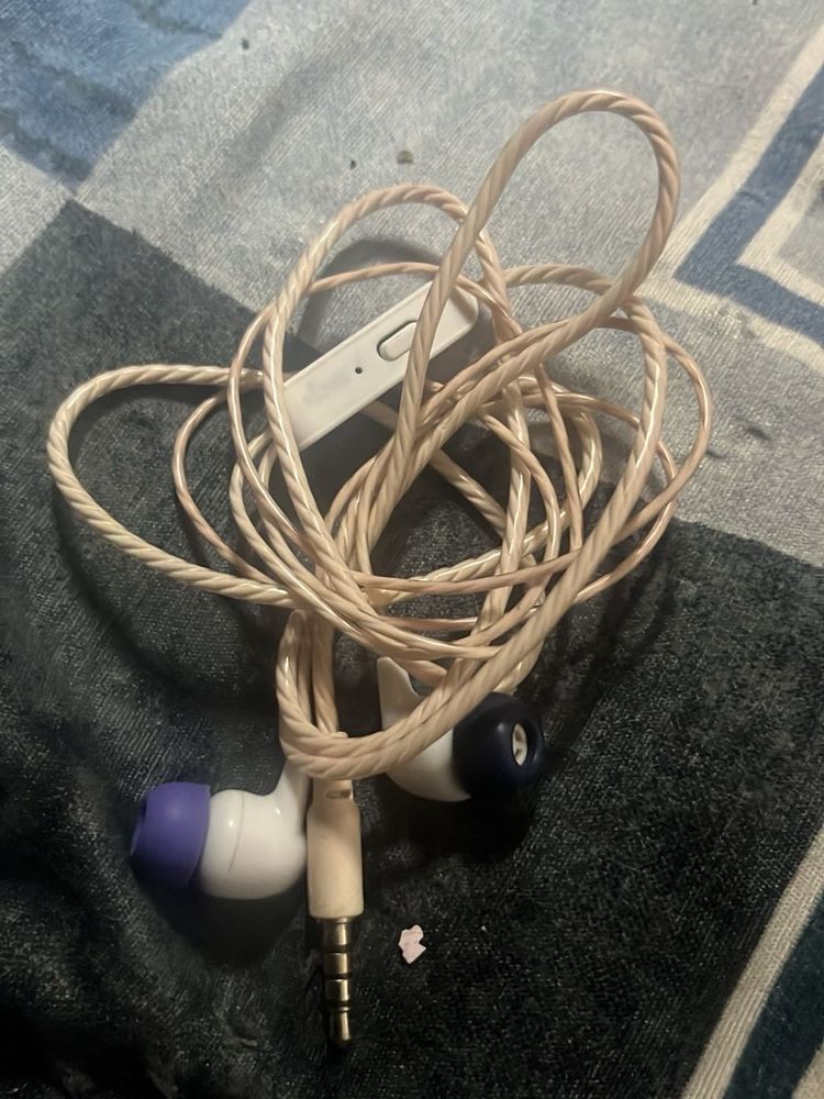 Used White Earphones