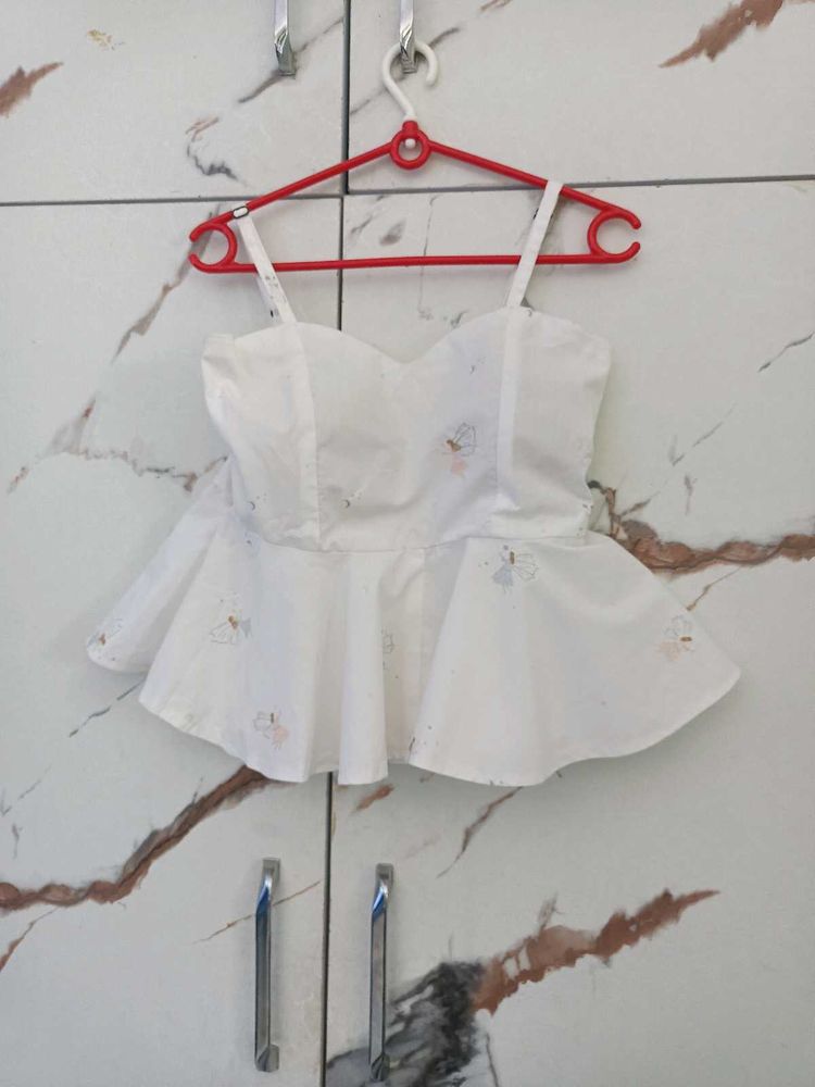 White Sleeveless Top