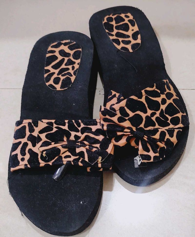 Animal Print Bow Flip Flops never used