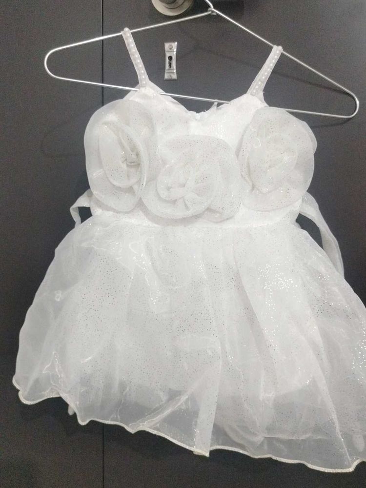White Sleeveless Frock