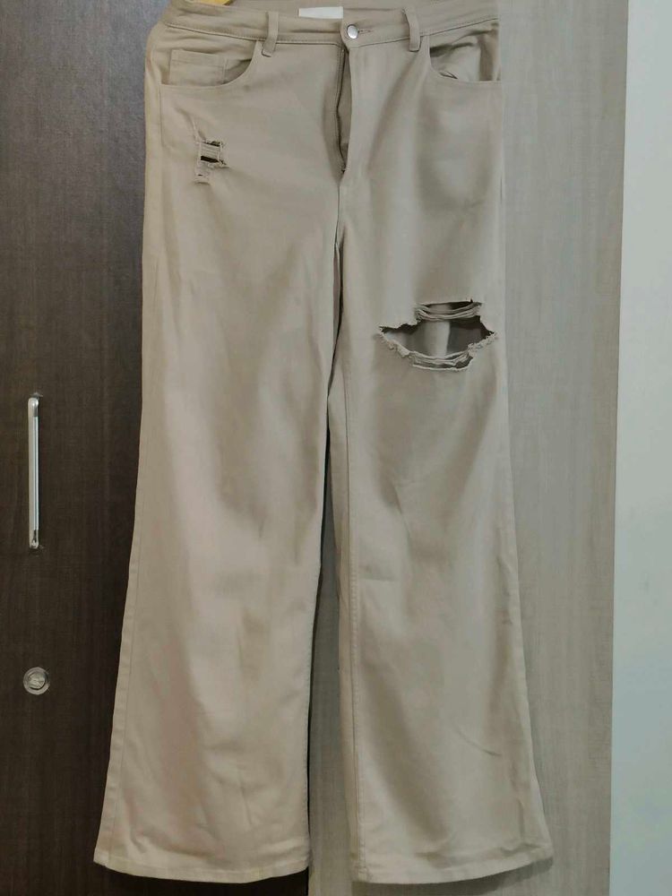 Beige Distressed Wide Leg Jeans