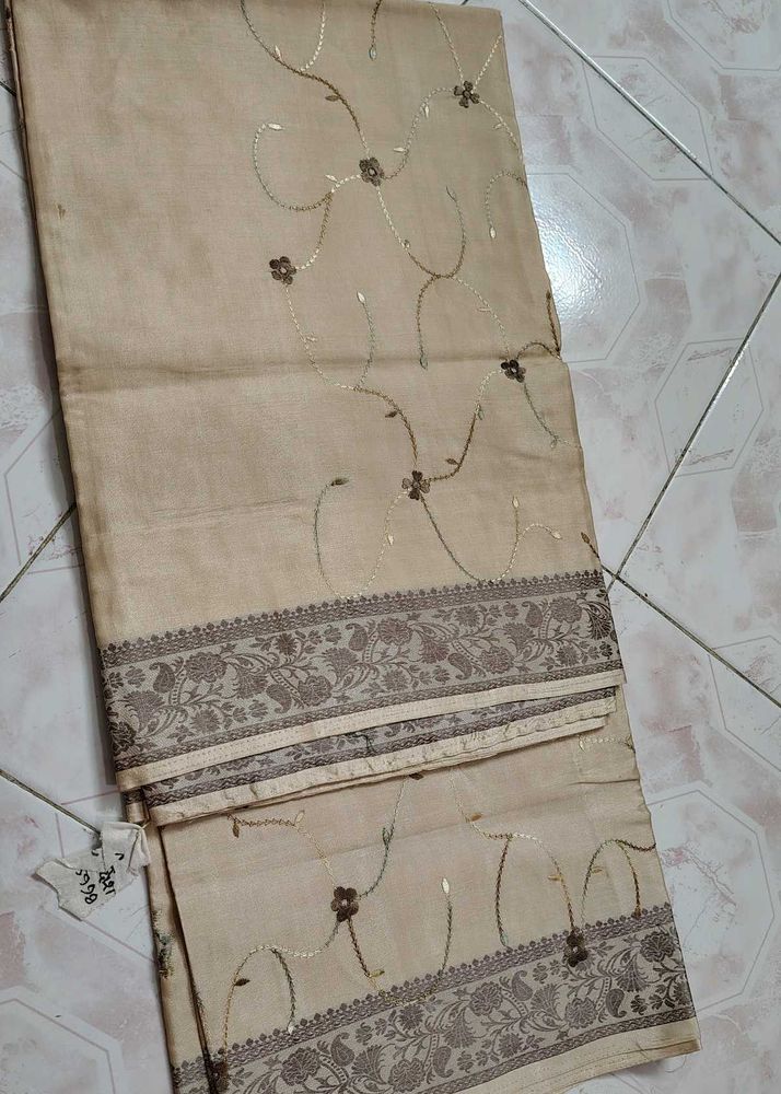 Beige Saree with stitched Blouse
