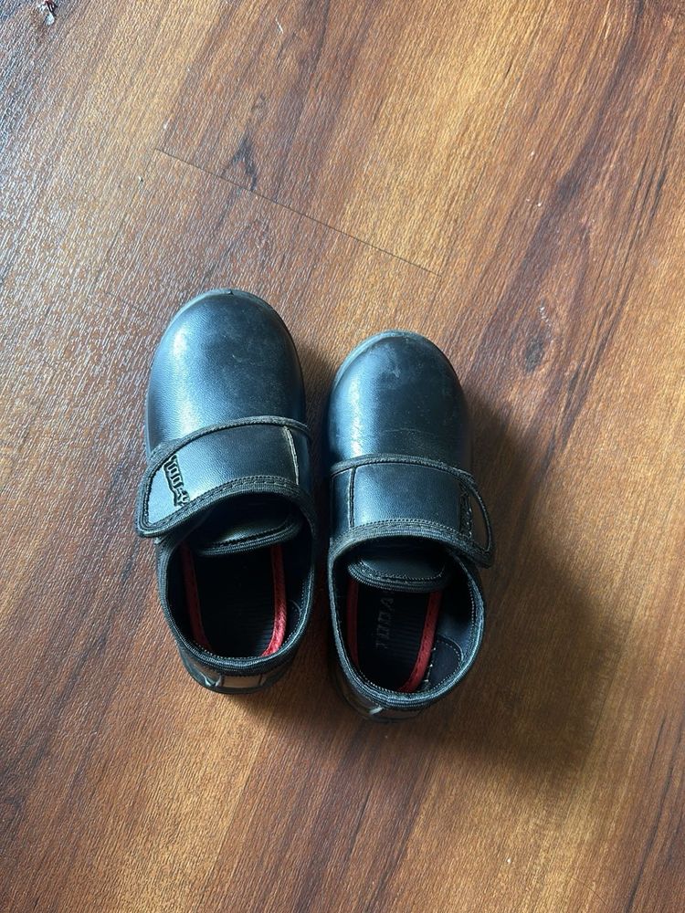 Black school shoes in size 8