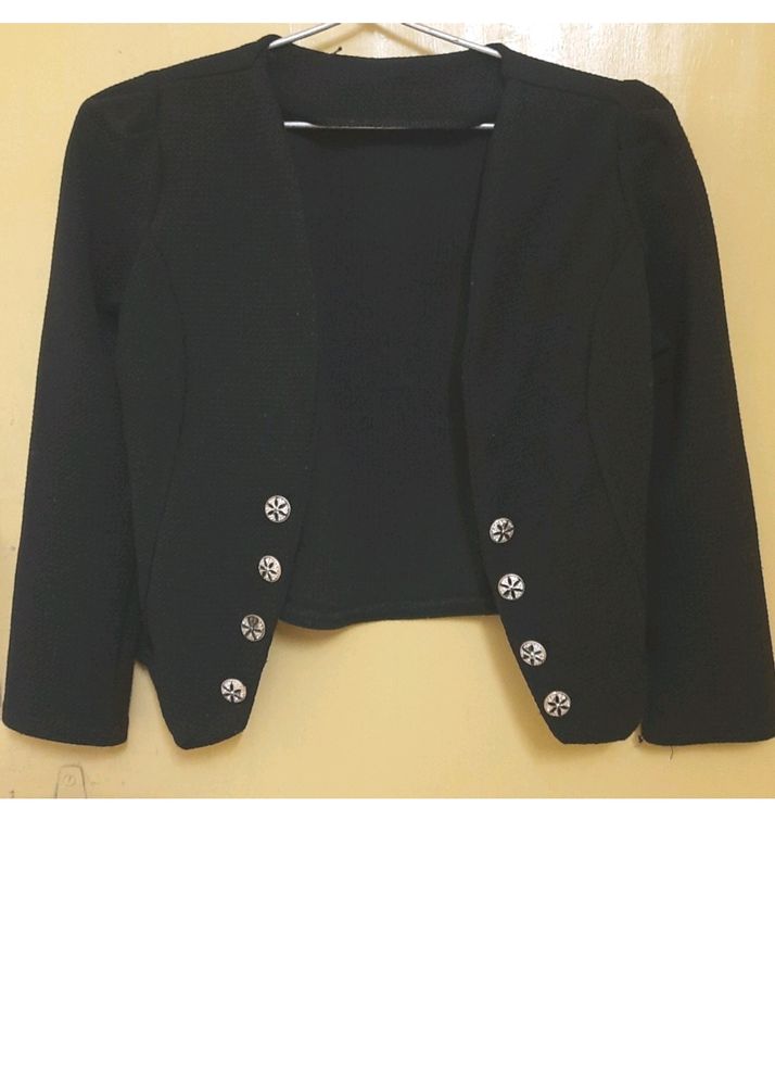 black colored crop jacket for women.Fabric cotton blend with front open style and buttons on.