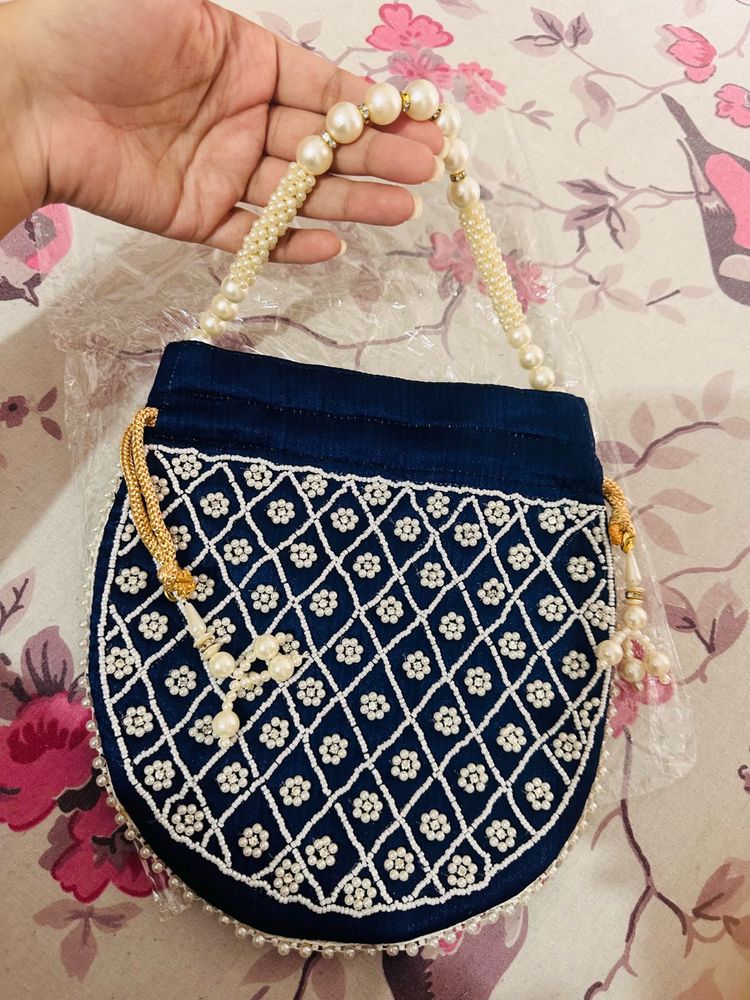 Elegant Heavy Blue Pearl Potli Bag with Tassels
