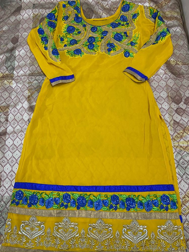 Yellow Kurta With Blue Patch Work