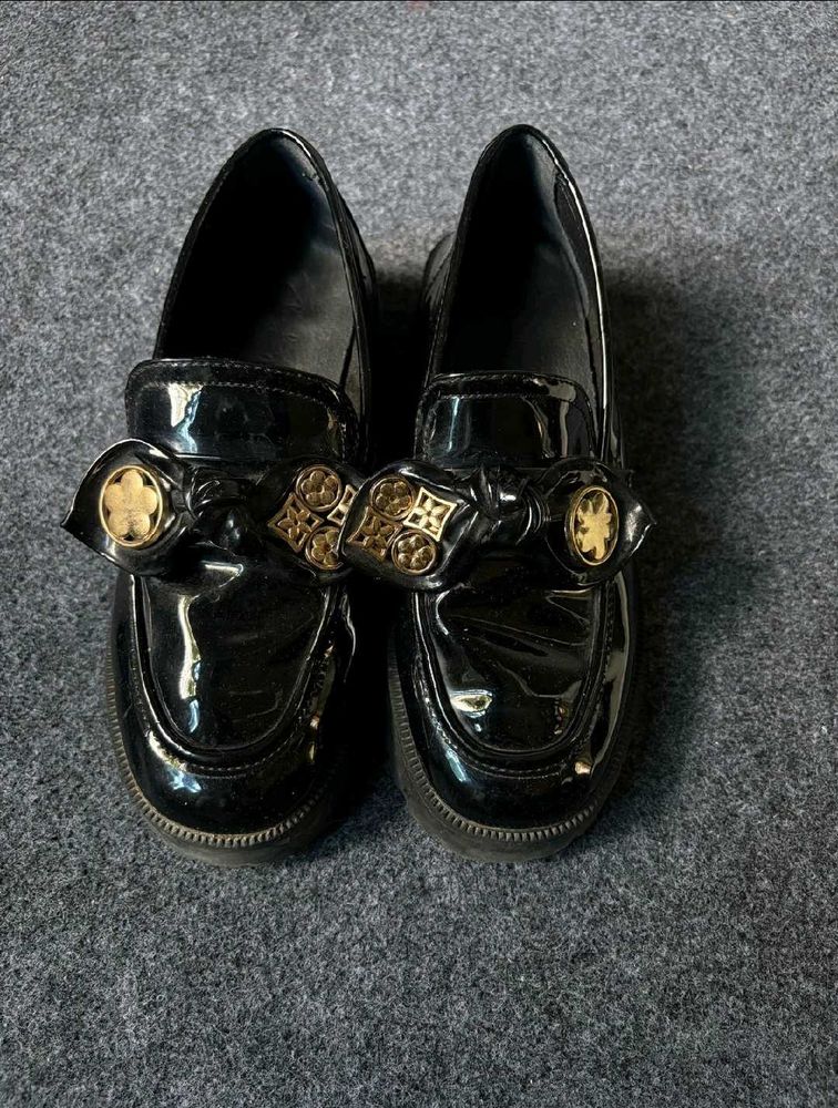 Black Loafers with Bow Detail