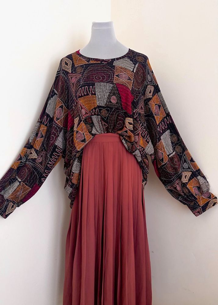 GEOMETRIC TOP