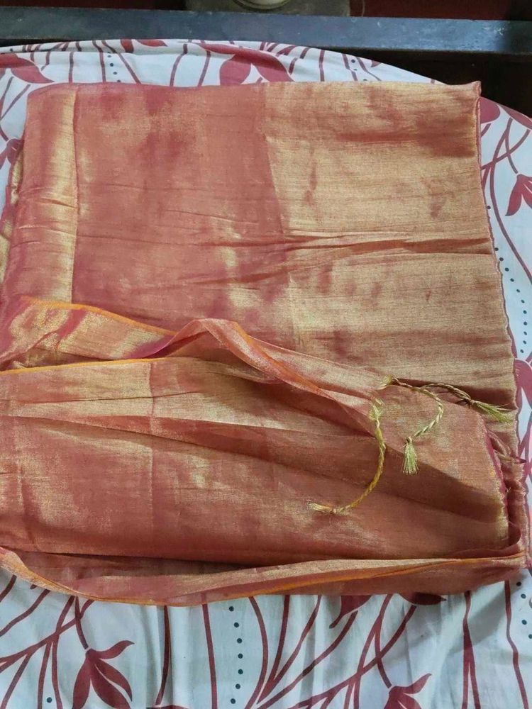 Peach pink and golden cotton tissue saree