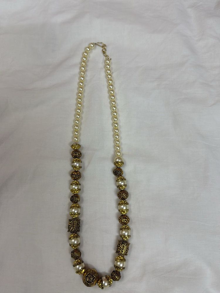 Heavy Pearl Necklace.