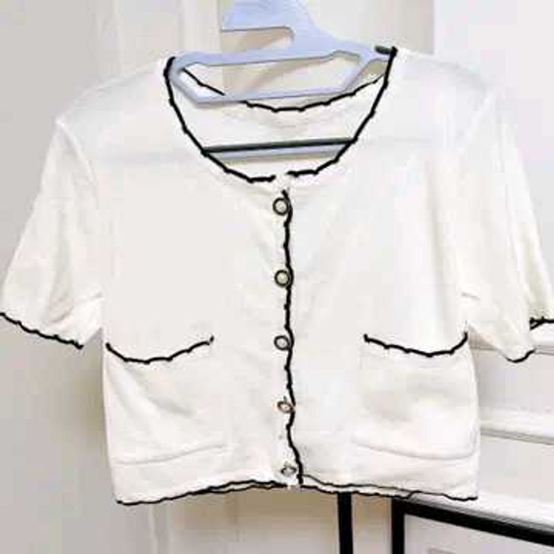 Chic White Cardigan with Black Trim