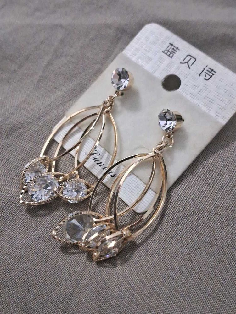 Elegant Gold Tone Dangle Earrings