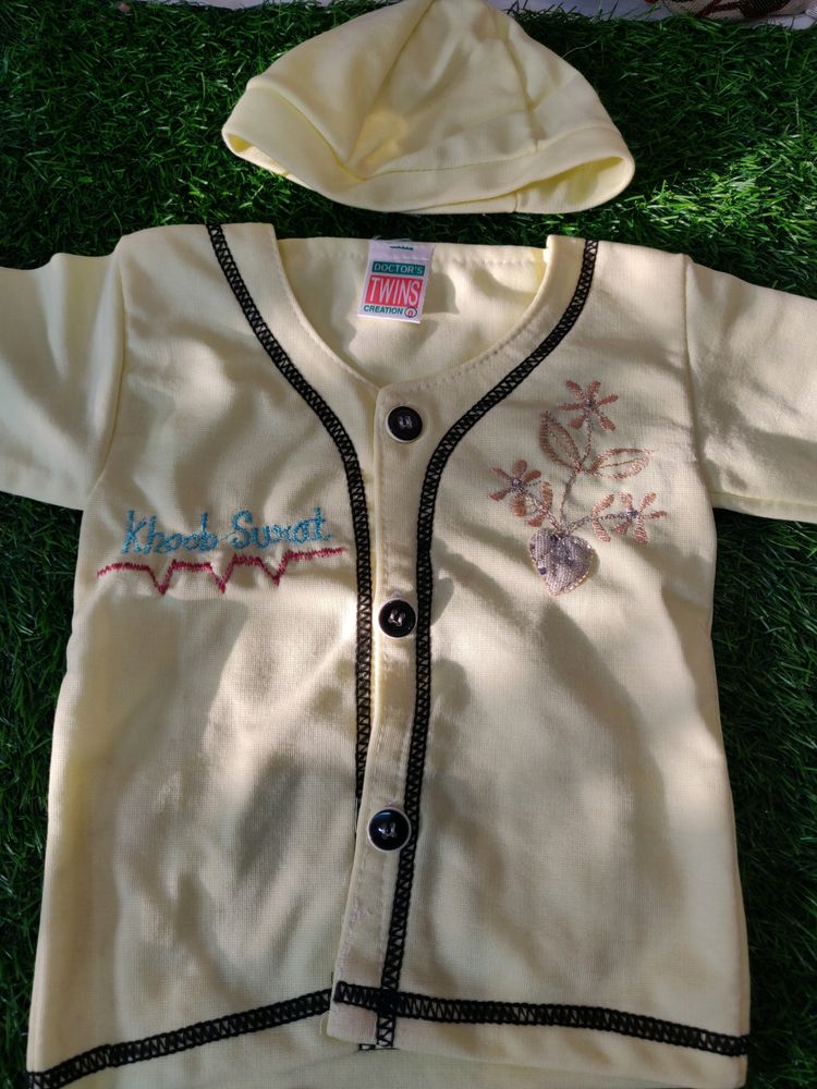 Cream Baby Set With Tshirt Shorts And Cap