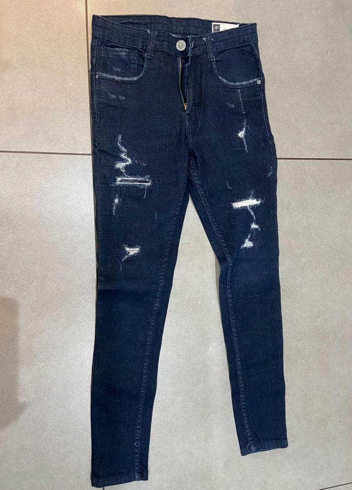 Distressed Denim Jeans