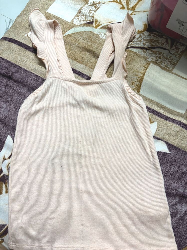 Soft Pink Ribbed Tank Top with Ruffle Straps..