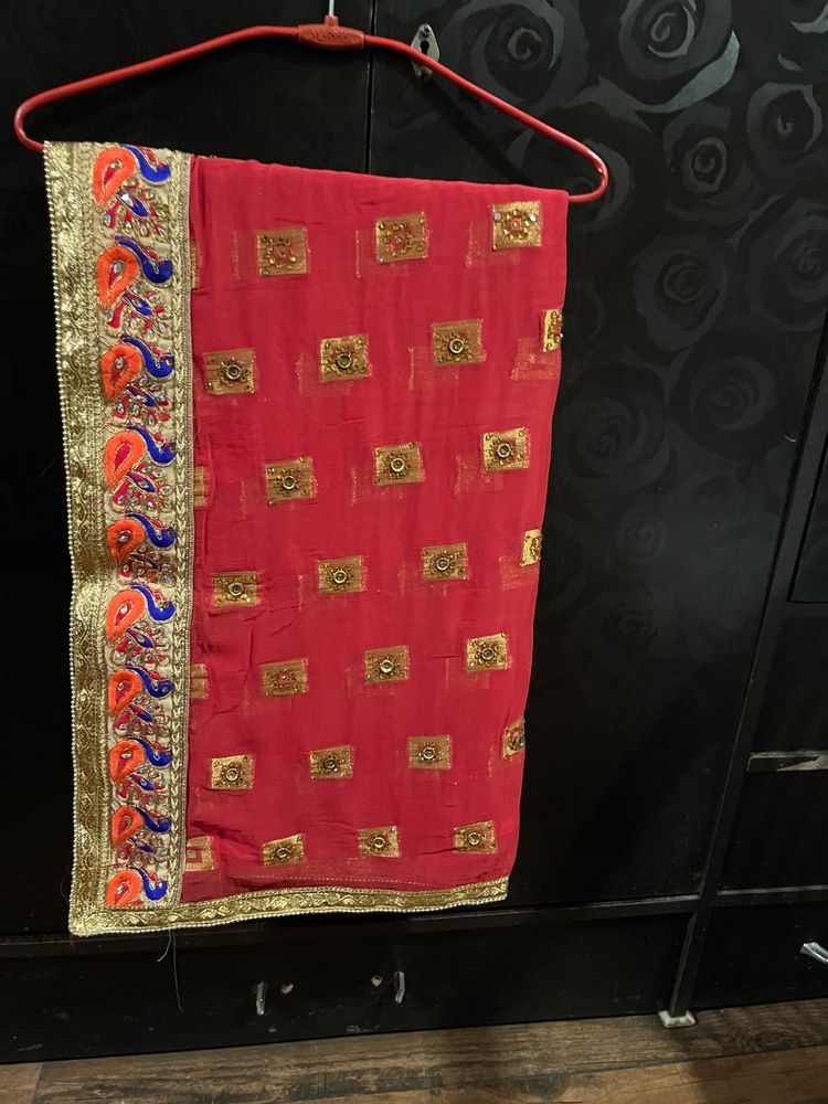 Elegent red embroidered saree