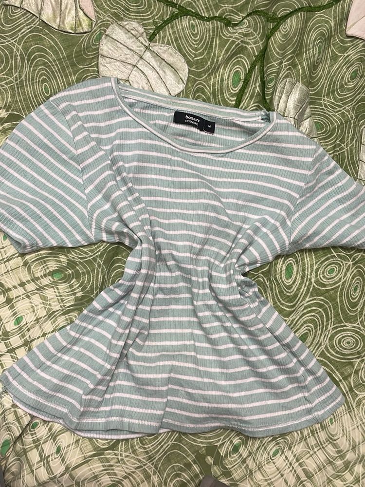 green and white striped top