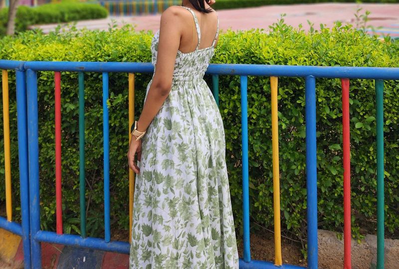 &#34;Backless. Bold. Beautiful. This floral dress is s