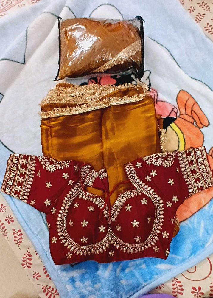 Golden Saree With Ready Partywear Blouse.