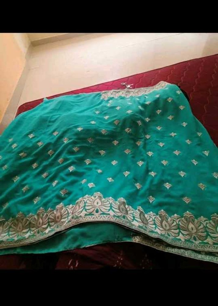 Elegant Teal green embroidery Saree with stitchied