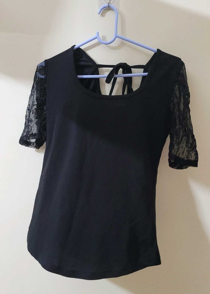Black Top With Sheer Sleeves And Back Knot