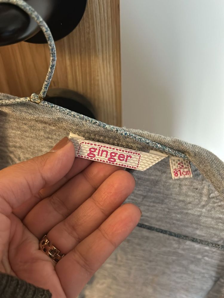 Grey shrug