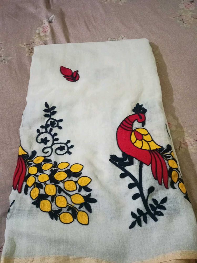 Elegant White Saree with Peacock Design