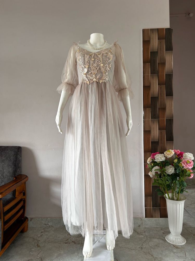 Faint pink tulle gown