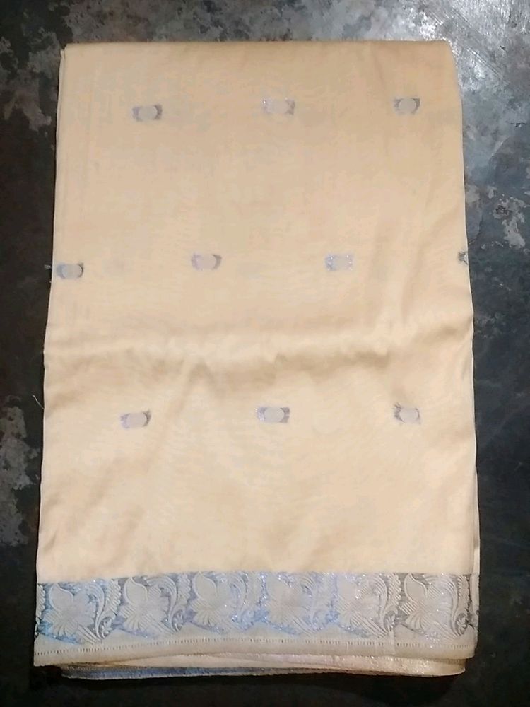 Elegant Cream Saree with Silver Border