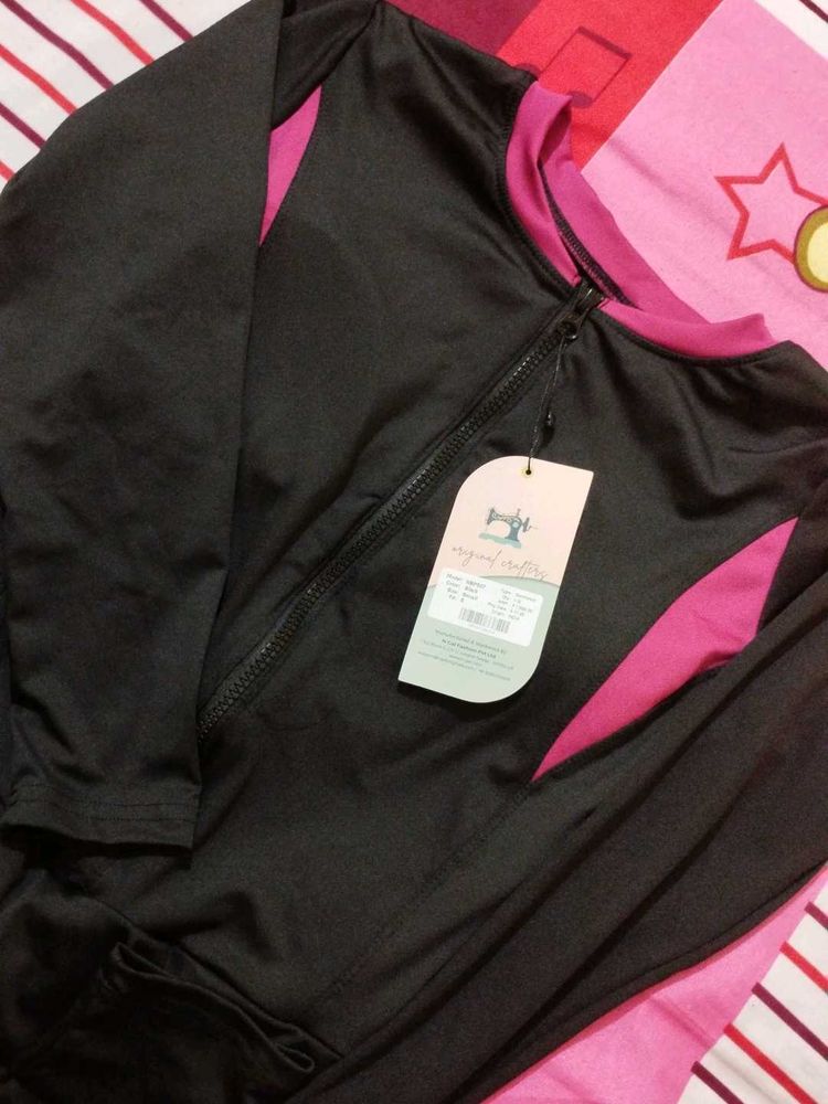 Black Swimsuit With Skirt And Attached Pant