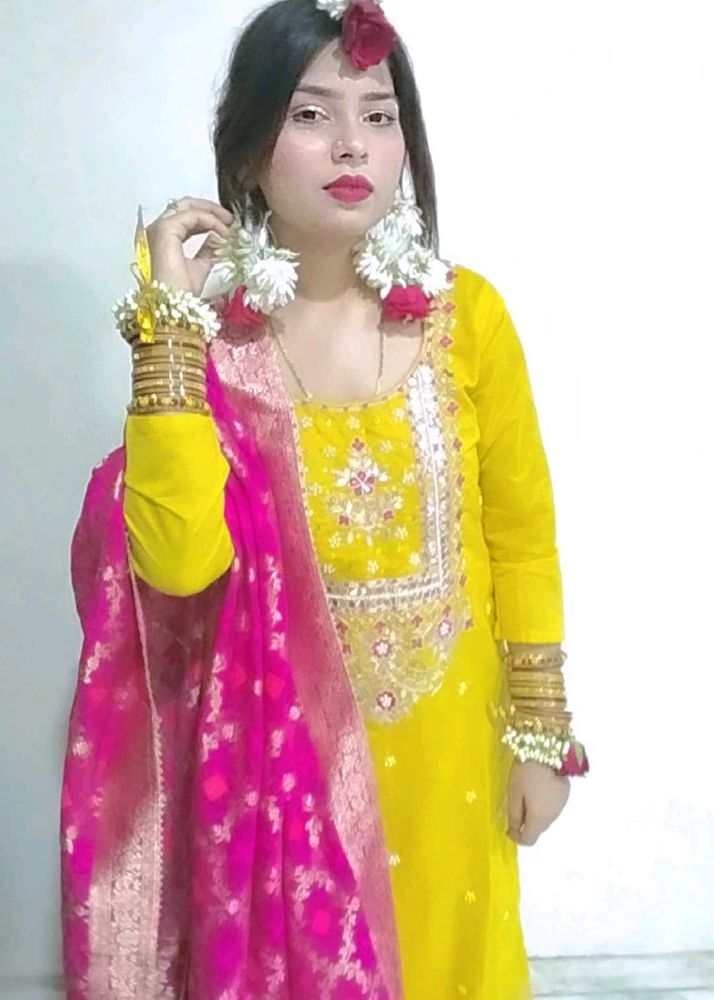Yellow Salwar Kameez with Pink Dupatta
