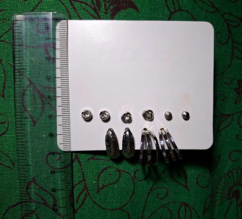 5 silver earrings