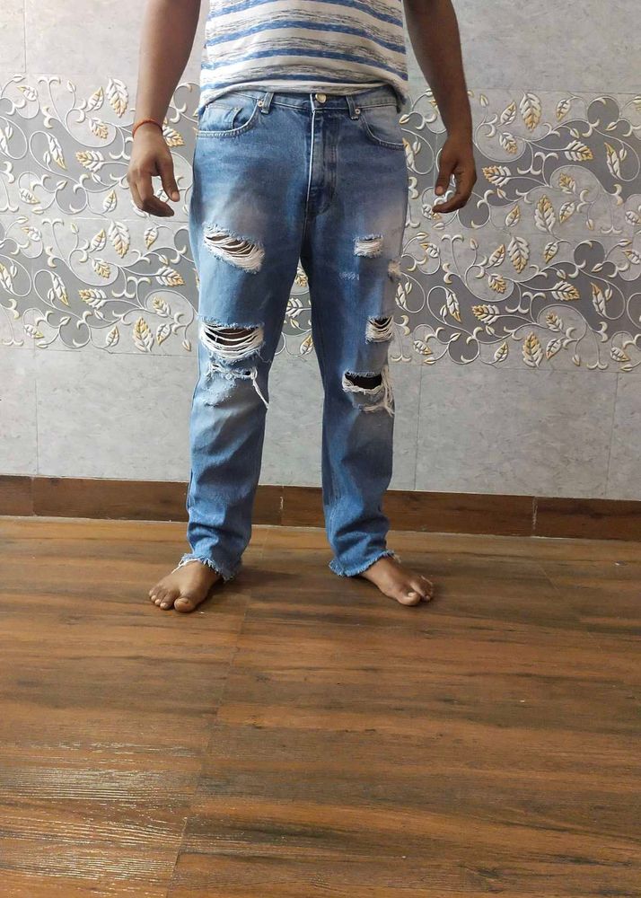 Ripped Blue Denim Jeans