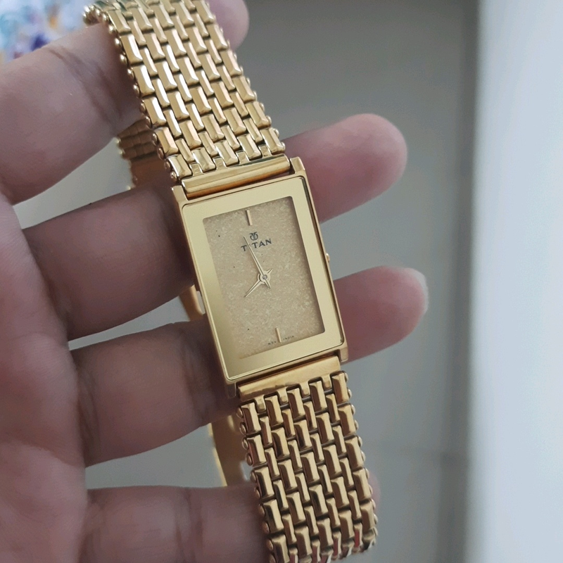titan golden watch