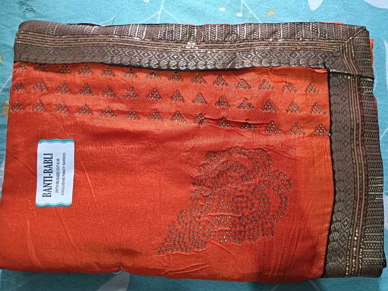 Elegant Orange Embellished Saree