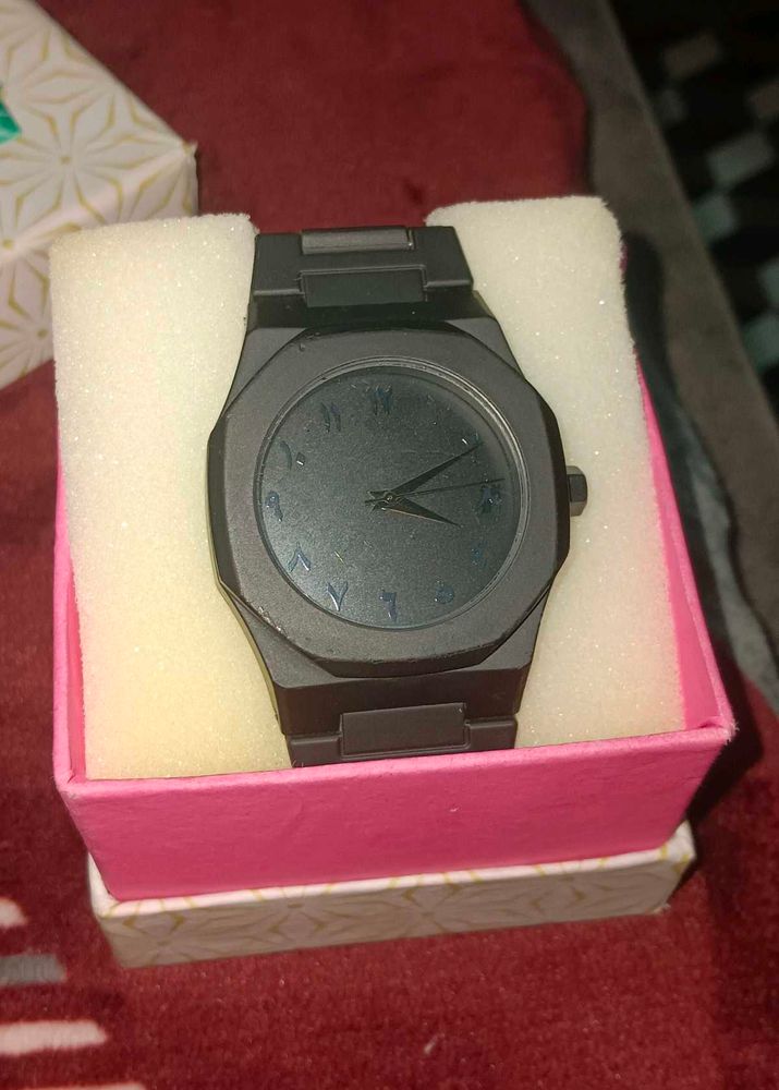 matt black watch with Arabic dial