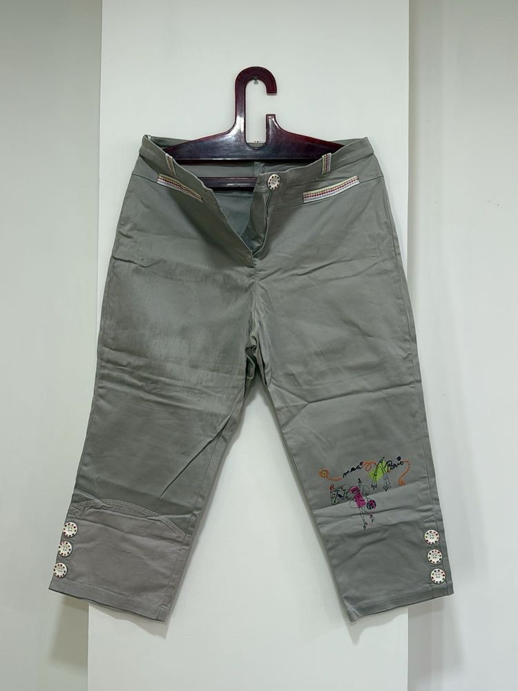 Brand new Capri Pants with Floral Detail