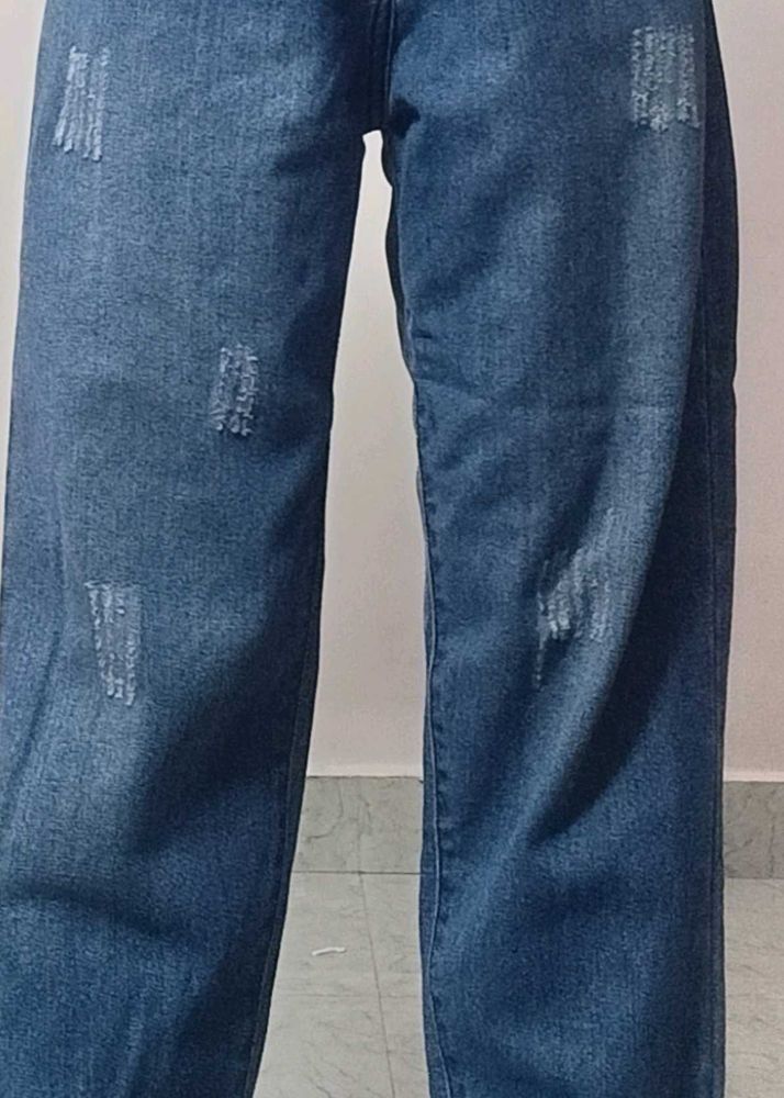 Ripped Blue Denim Jeans